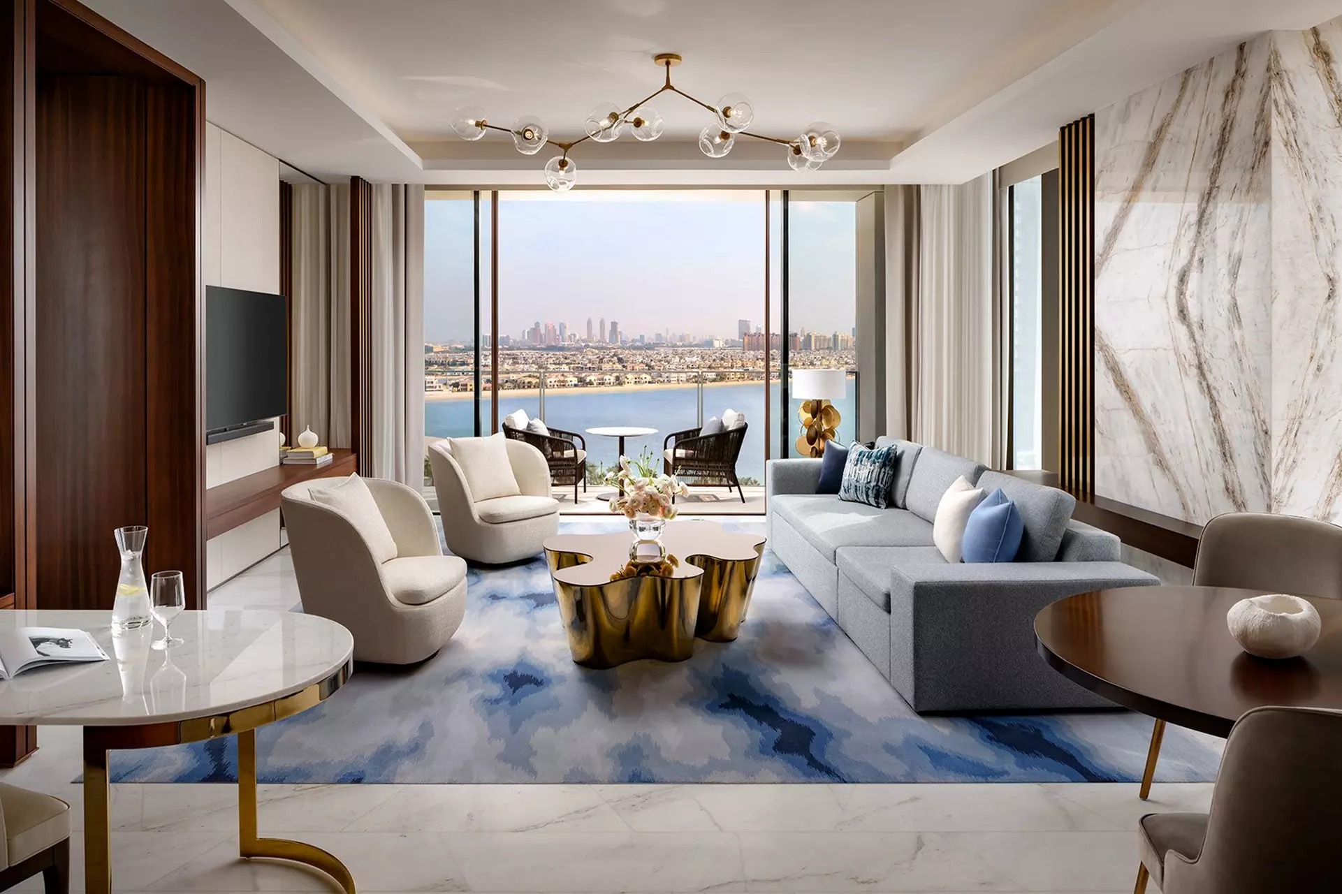 Suite living area shown in the Dubai invitation brochure